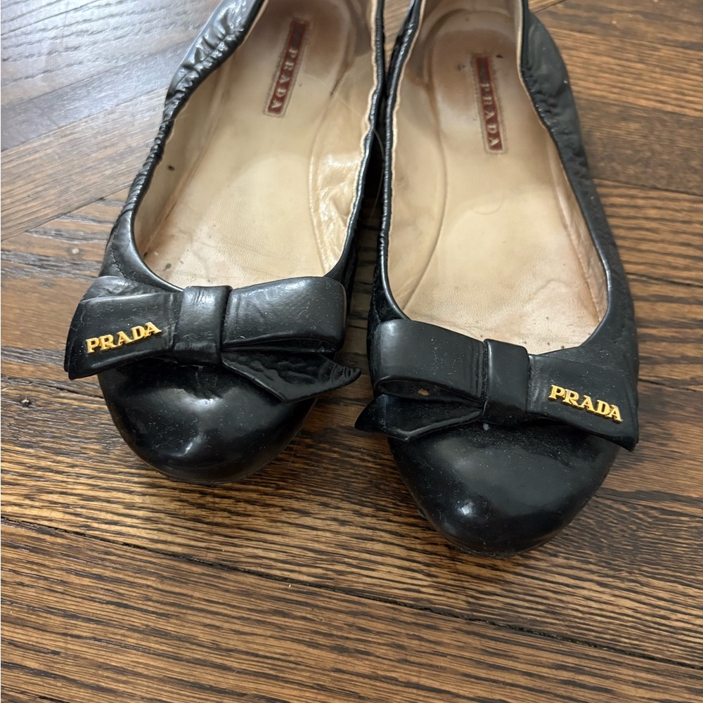 Prada Women's Black Flats with Bow Accent
